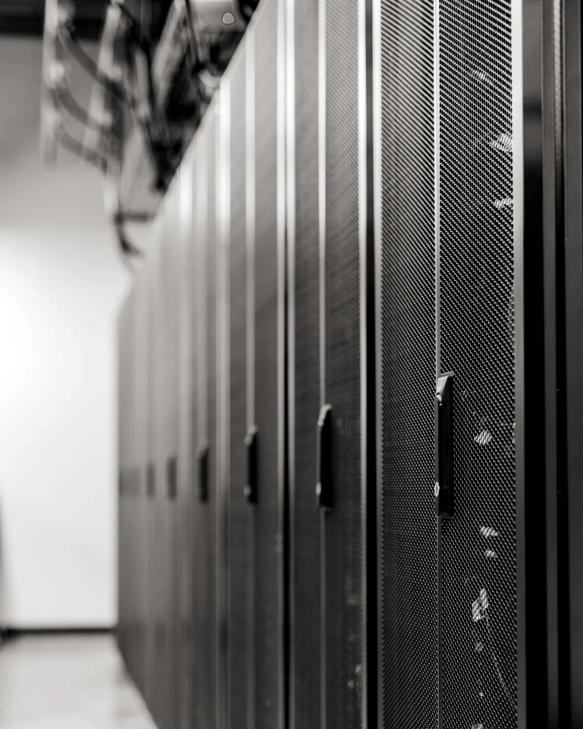 Racked servers in a data centre aisle